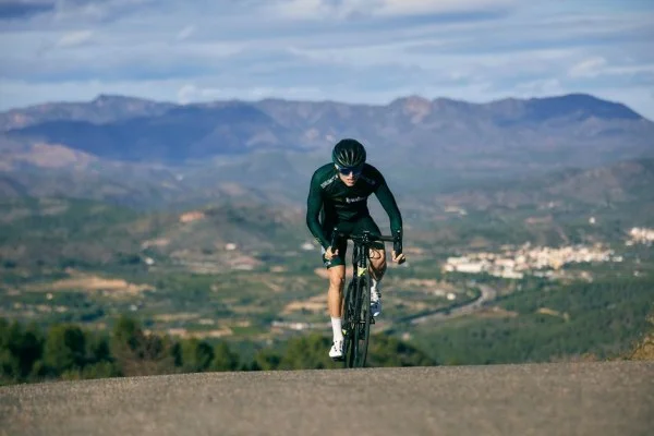 cyclist climbing mountain